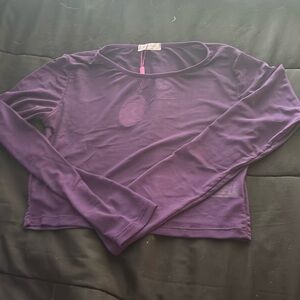 Selling purple see through shirt from Avidlove, it’s a size small